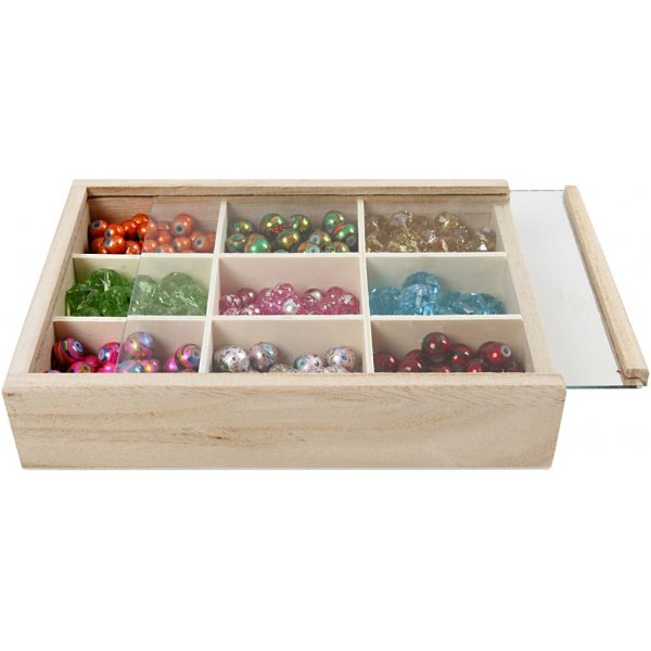 Laatikko, jossa lokerot ja suojakansi